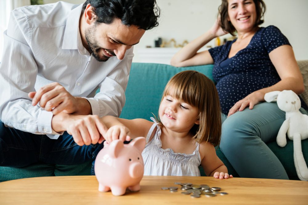 Family with piggy bank